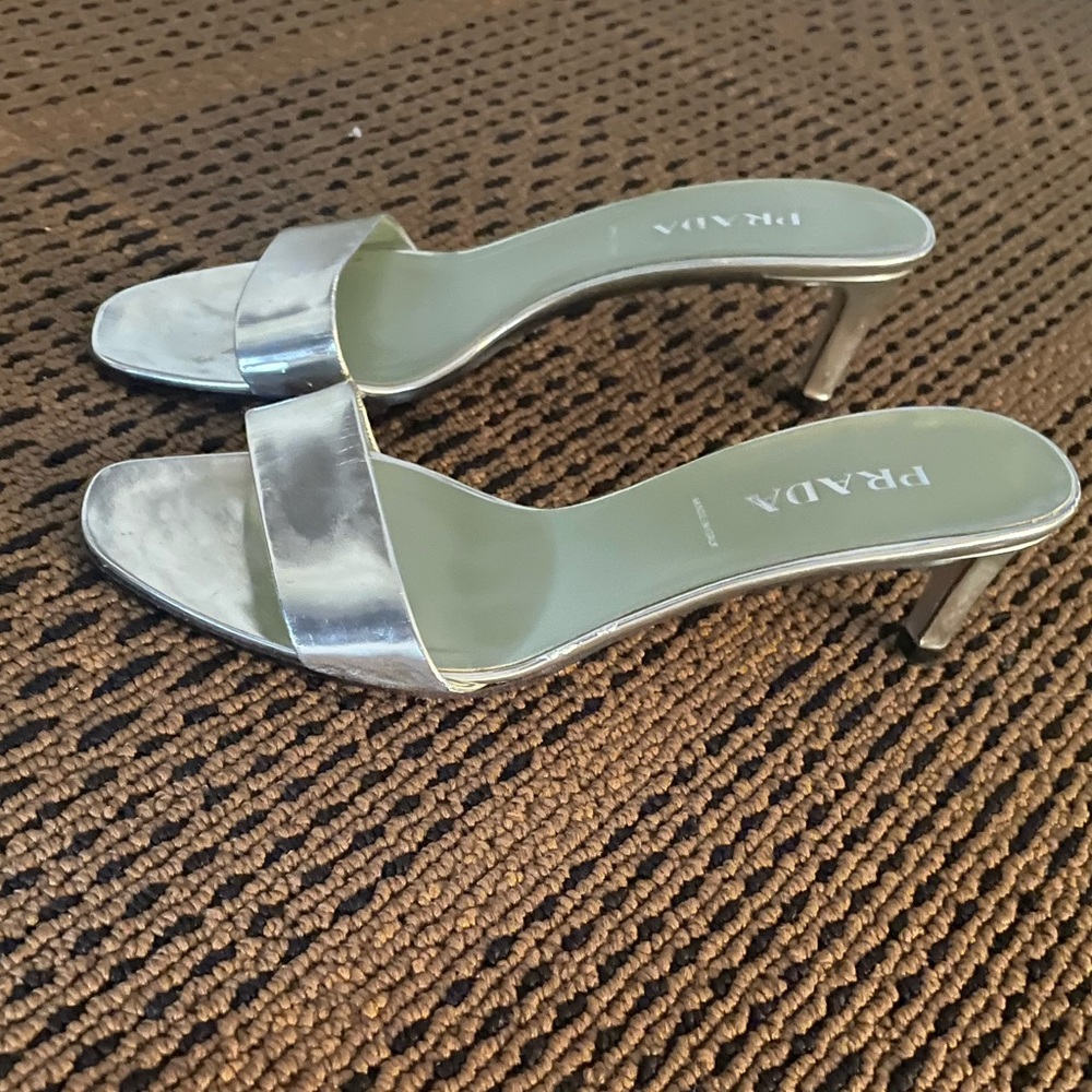 Silver Prada kitten heels